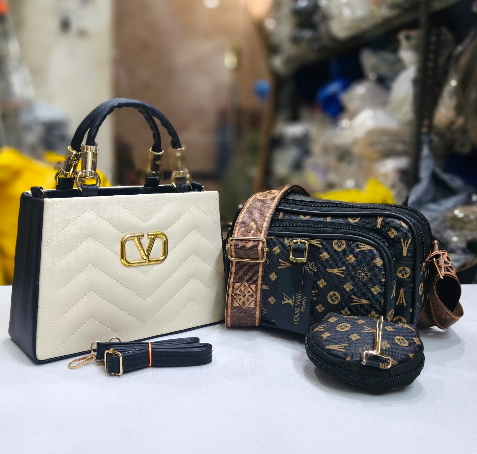 VALENTINO AND LOUIS VUITTON HANDBAGS