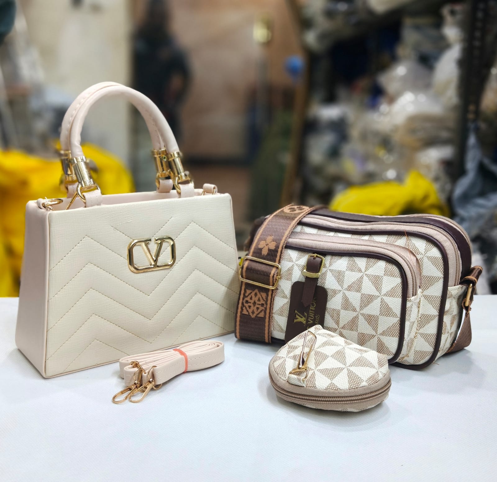 VALENTINO AND LOUIS VUITTON HANDBAGS