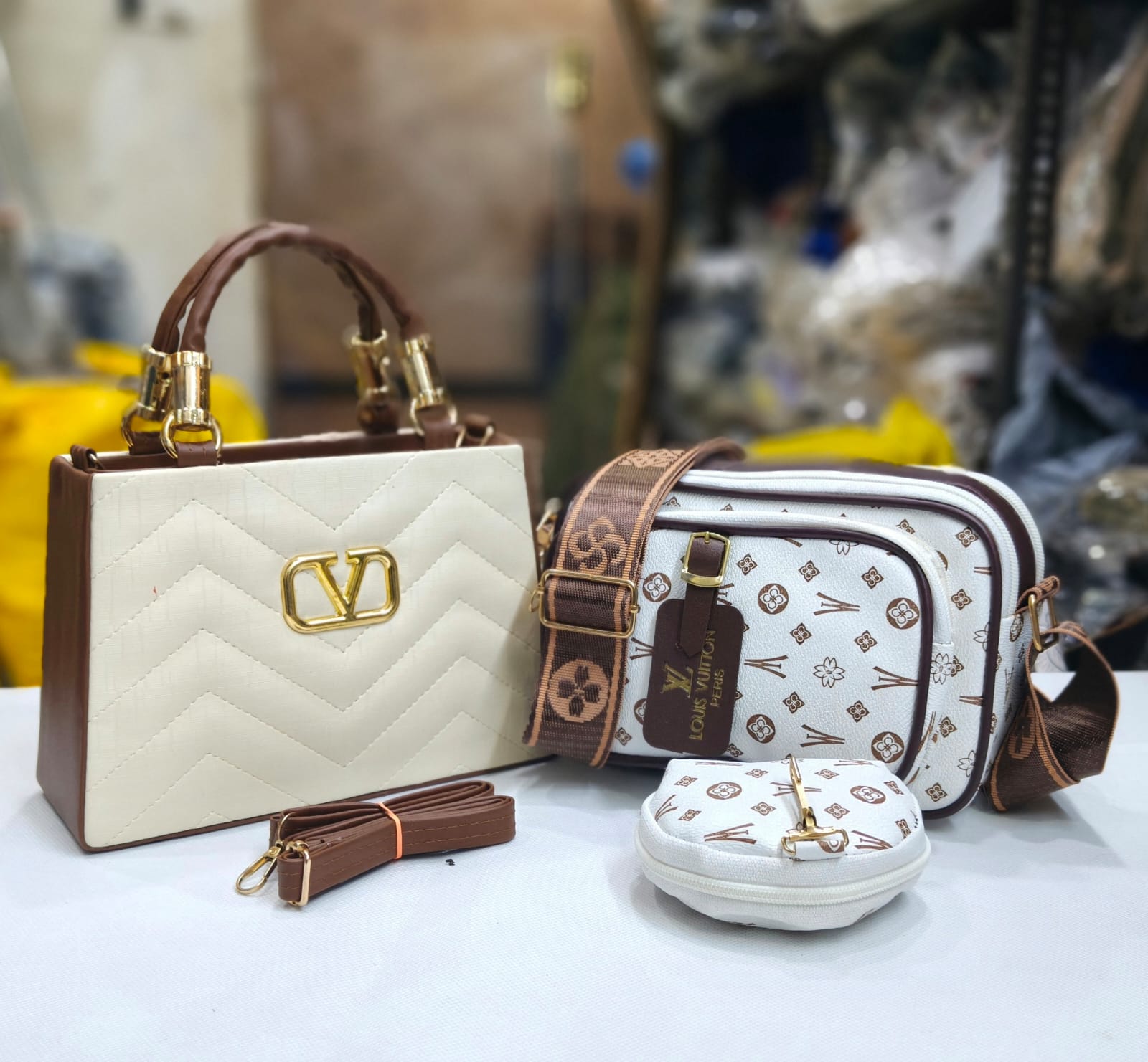 VALENTINO AND LOUIS VUITTON HANDBAGS